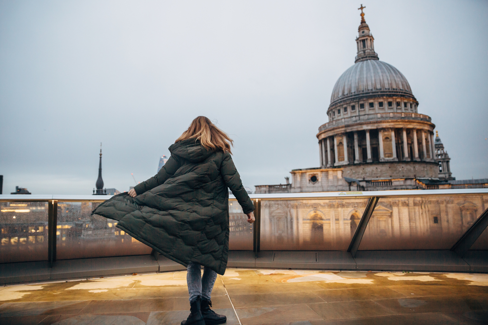 woman standing in jacket in London 