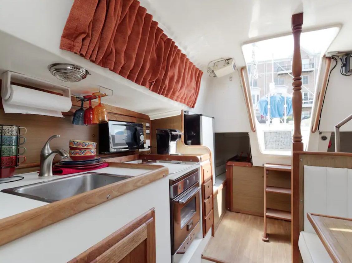 Kitchenette inside a sailboat in one of the best airbnbs in baltimore