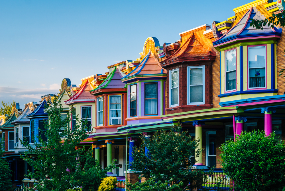 Colorful row homes in baltimore one of the best airbnbs in baltimore