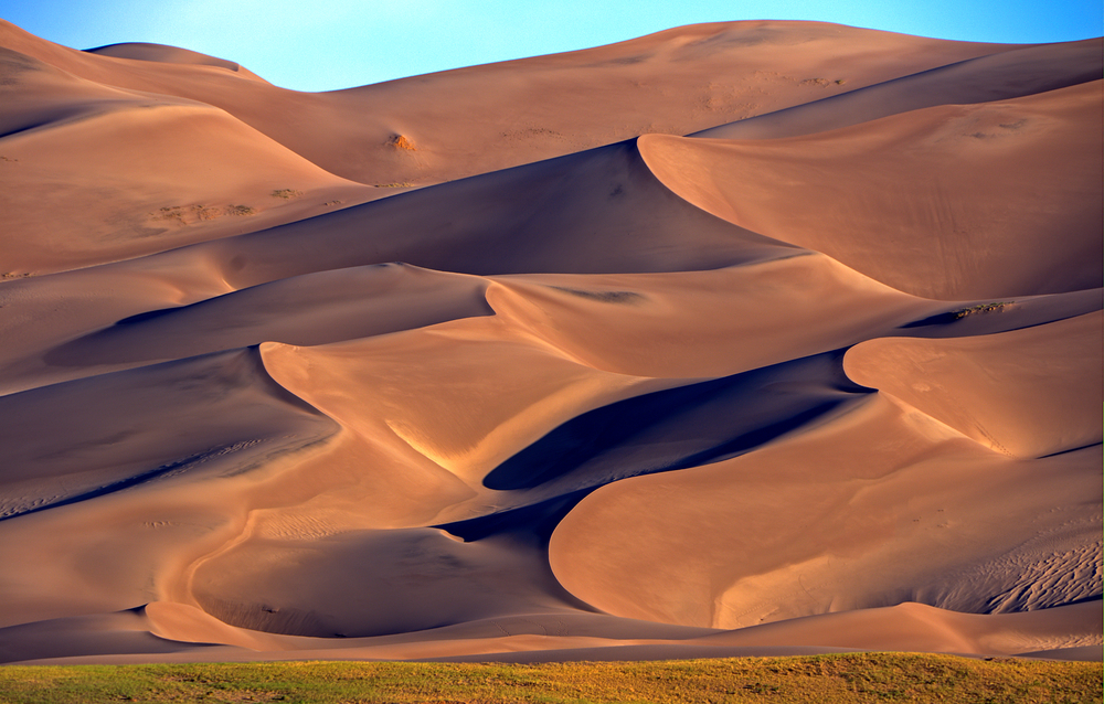 The tall sand dunes of Great Sand Dunes National Park with amazing contrast.