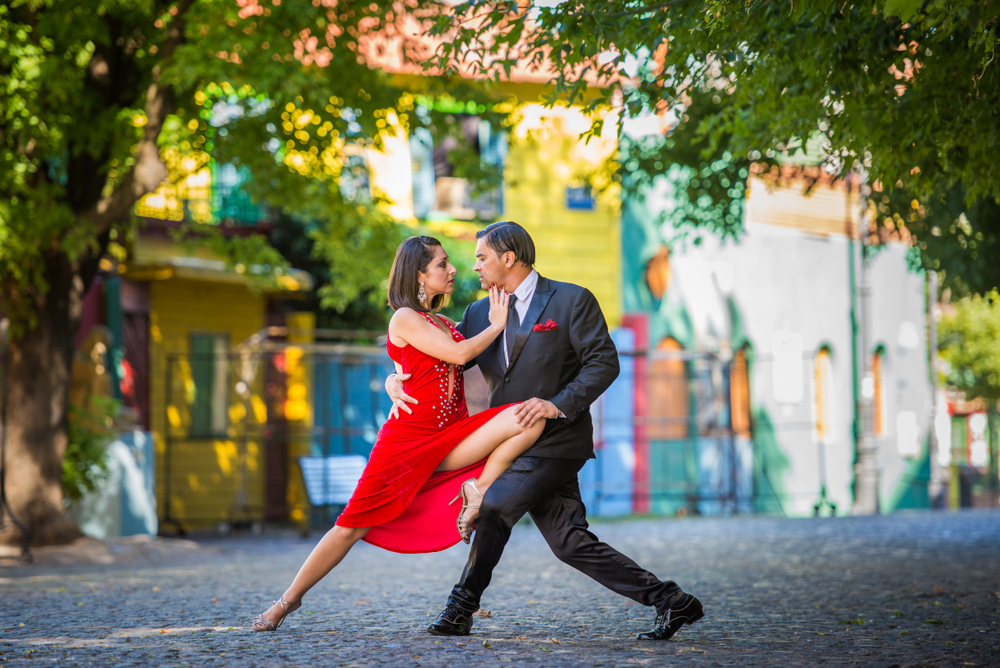 Argentine tango couple posing in a street in Buenos Aires. 