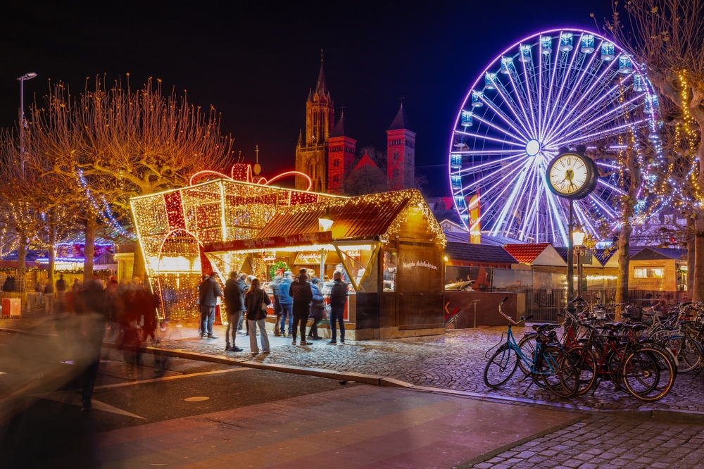 A large market in Valkenburg proves why this is one of the best Christmas towns in Europe: a giant Ferris wheel glows, and chalets are surrounded by hanging lights, as well as lights that are designed to look like Christmas gifts. 