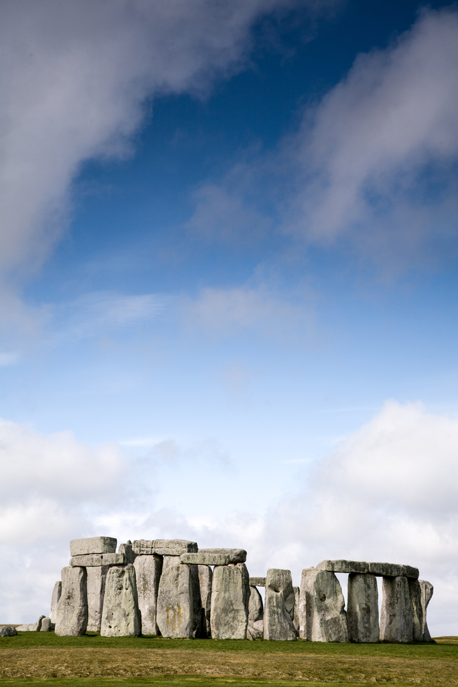 a circle of large rocks stand in formation at stonehenge in england 