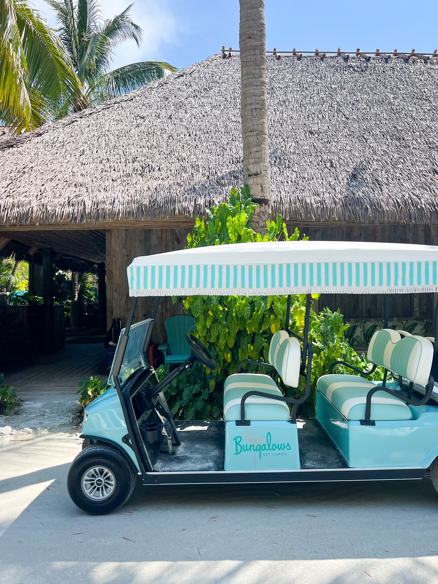 A golf cart awaits you after you check in at the Bungalows All inclusive Resort