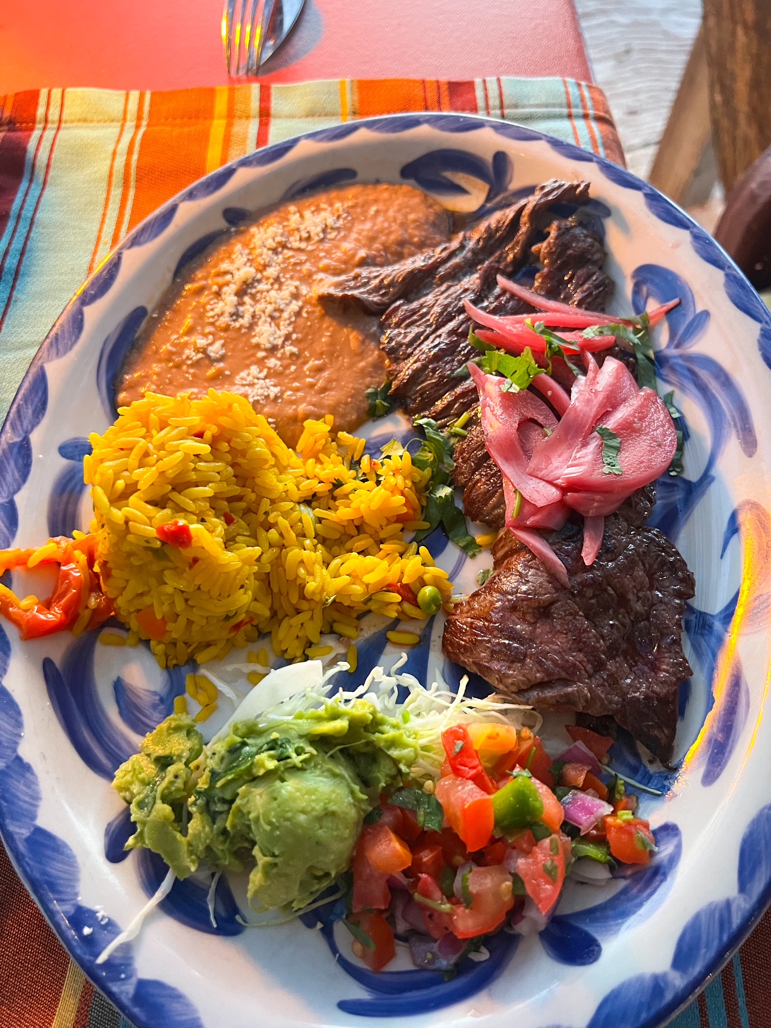 a mexican feast with meat rice and beans ad Sea Señor restaurant