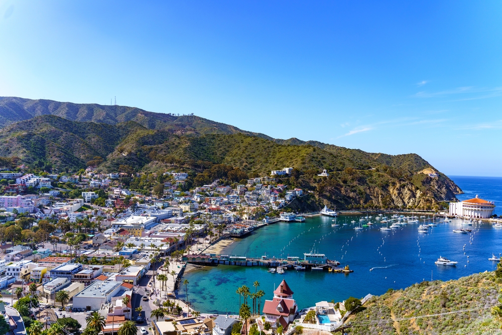 Harbor at Catalina Island California. You can see the bay, buildings and mountains. one of the best Islands USA citizens can visit without a passport .