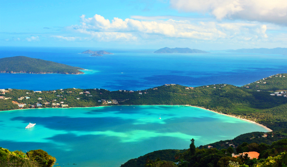 A beautiful view of Magen's Bay as seen from the mountain top in St. Thomas, Virgin Islands. one of the best Islands USA citizens can visit without a passport. 