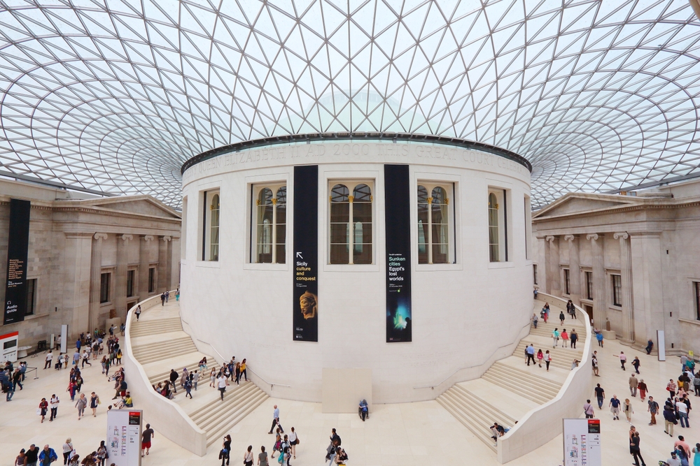 The great court in the British Museum. The white building has an impressive glass roof. 