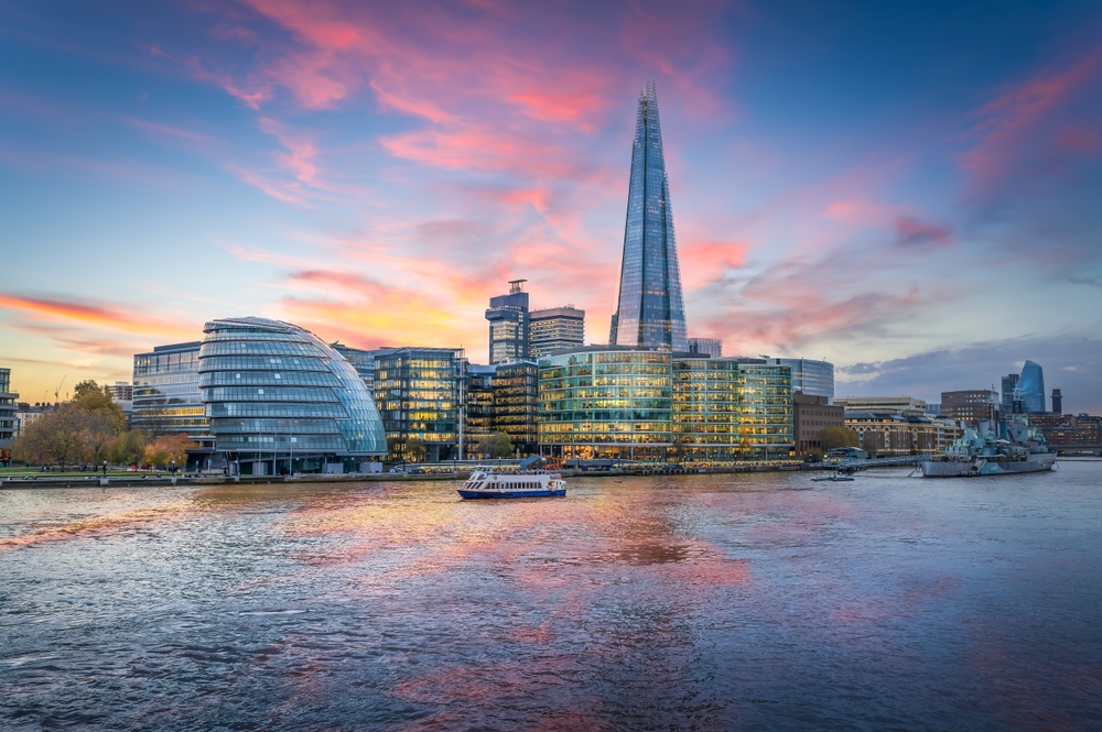 Breathtaking London skyline featuring The Shard and River Thames taken at sunset. 