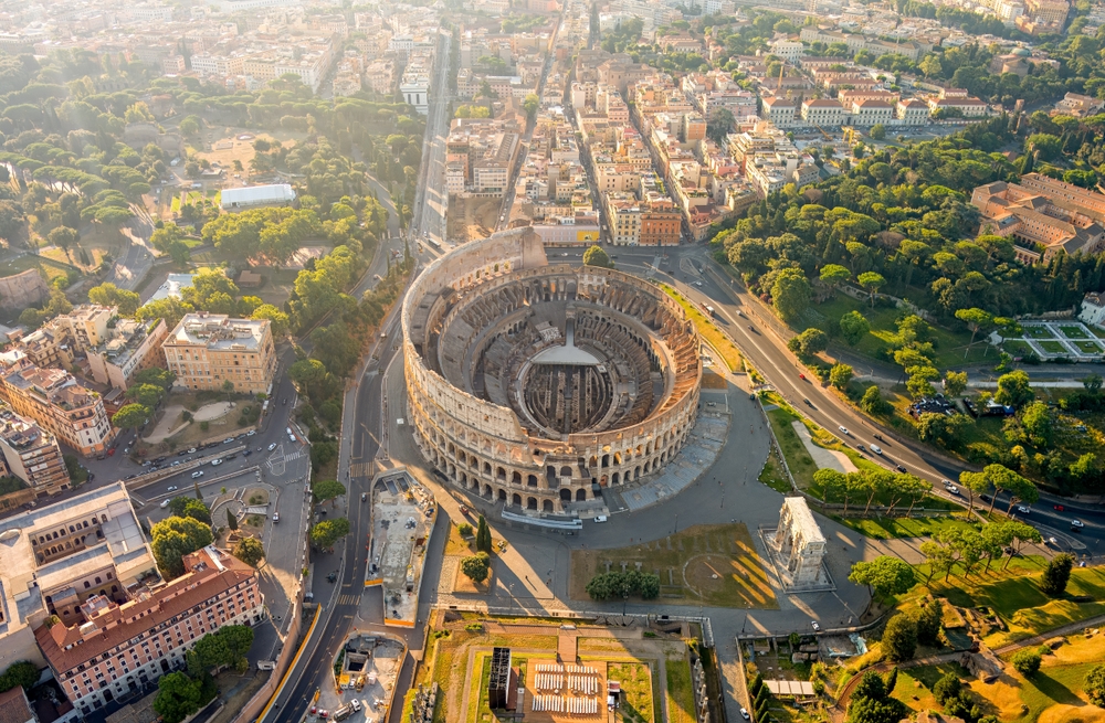 bird's eye view of the Colosseum and the city surrounding it