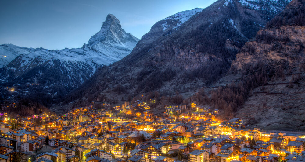 magical night photo of Zermatt Switzerland at night with mountain during winter