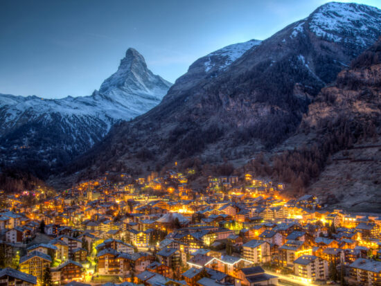 magical night photo of Zermatt Switzerland at night with mountain during winter