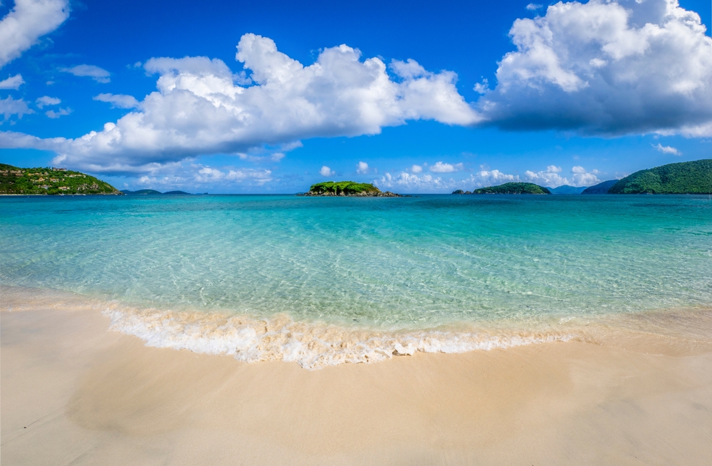 The amazing turquoise water and sandy  Cinnamon Bay beach in the Virgin Islands National Park on the island of St John in the US Virgin Islands