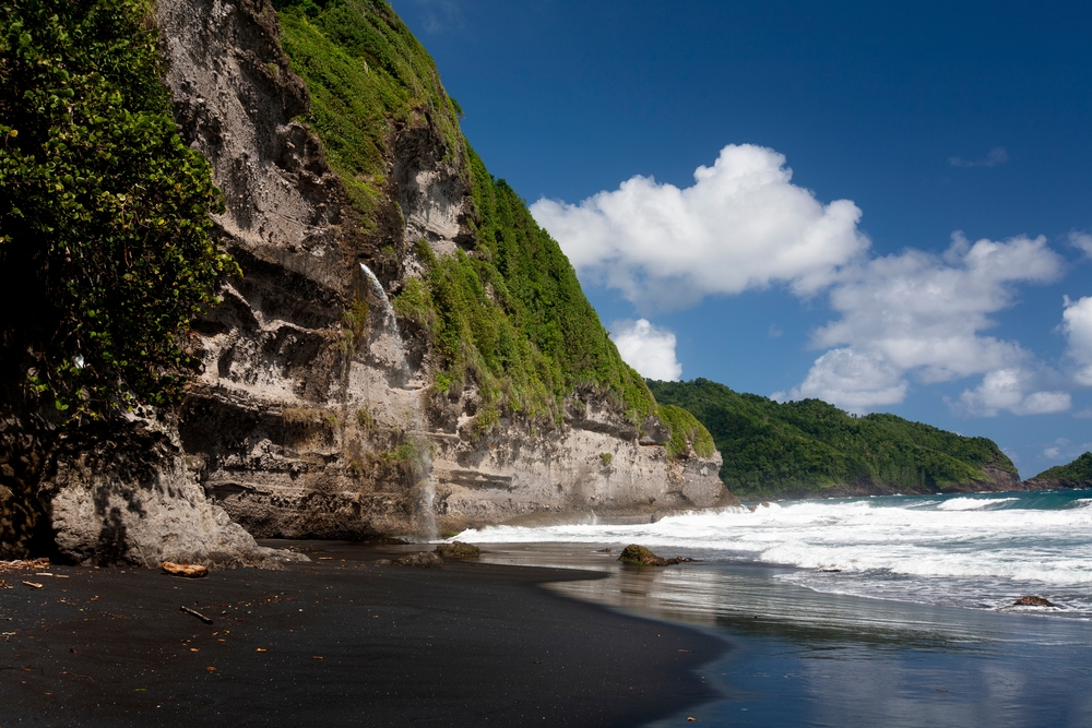 the black sand beaches in Dominica is Caribbean Island honeymoon destination for those looking for adventure 