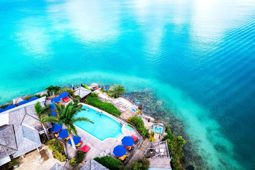 Birdseye view showing the pool near the ocean in one of the  adults-only-all-inclusive-resorts-in-the-caribbean. 