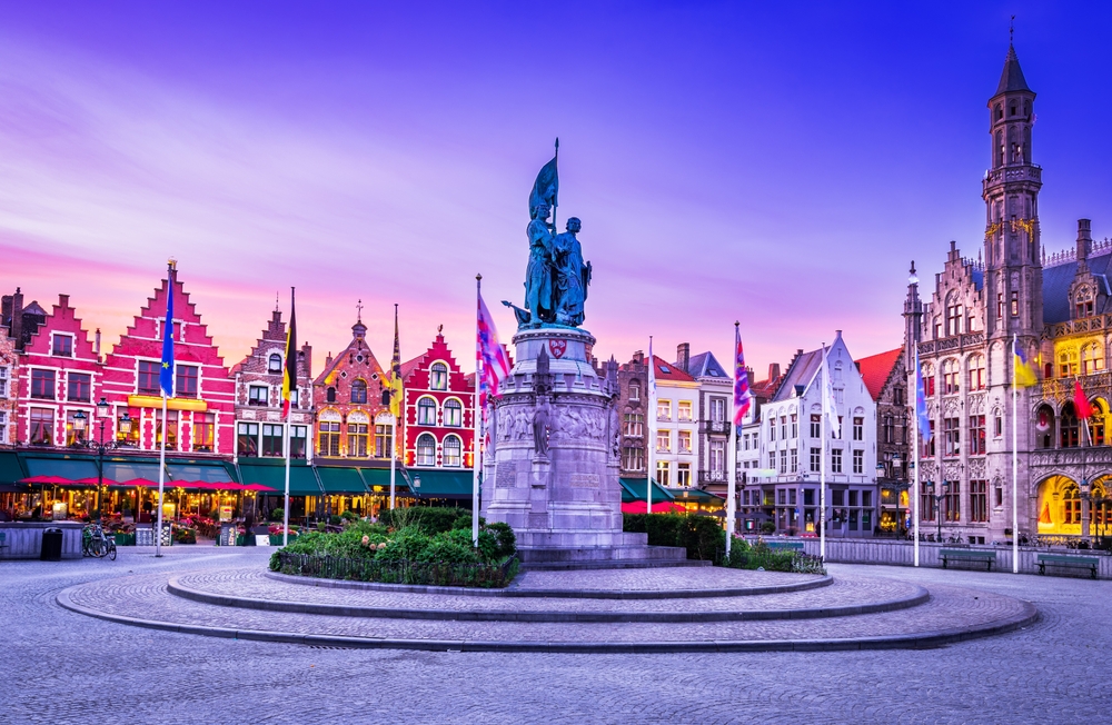 Bruges, Belgium. Grote Markt, meeting place of the Brugeling. The article is about European towns you have never heard of. 