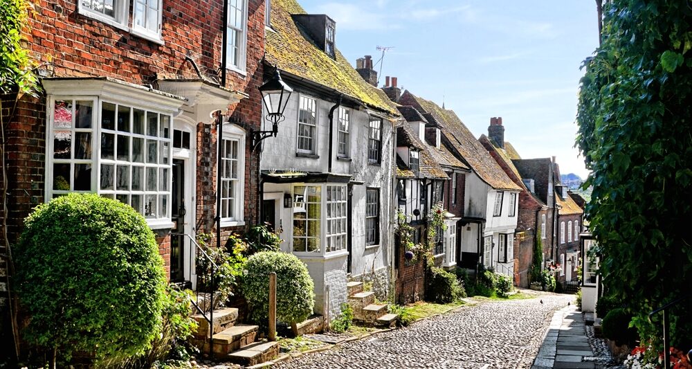 cute town of Rye in Europe with bushes in front of it