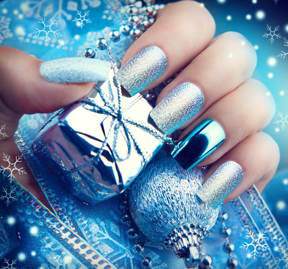 Winter Holiday style bright Manicure Design. Christmas decorations and snowflakes.