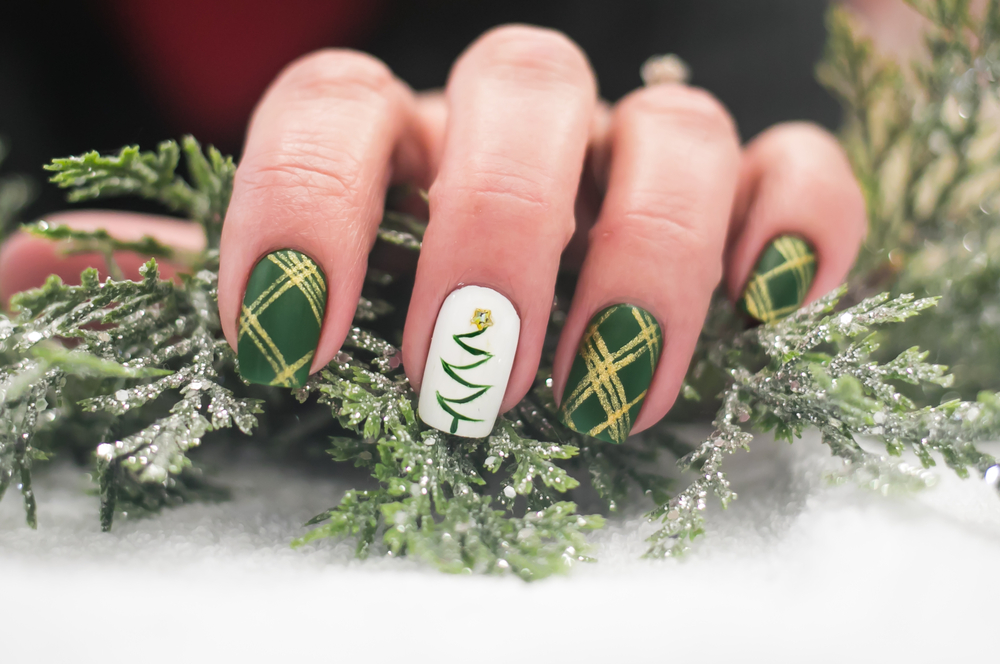 Christmas Themed Nail Art Design in an article about Festive Christmas Nail Ideas. 