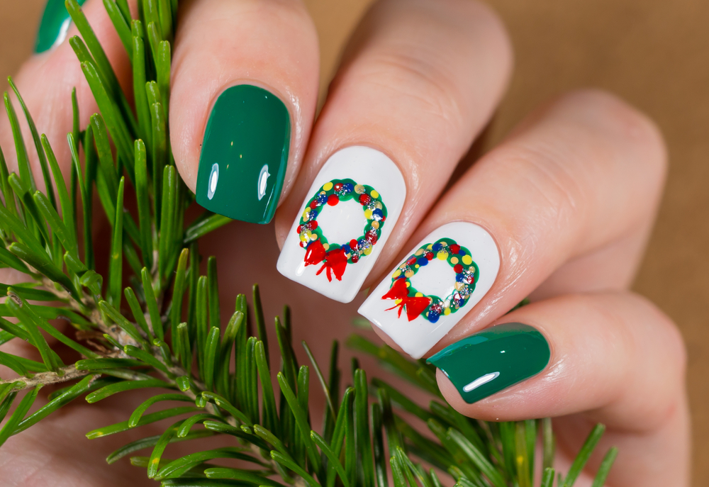 hristmas Nail art manicure. Winter Holiday style bright Manicure Design. Christmas decorations.