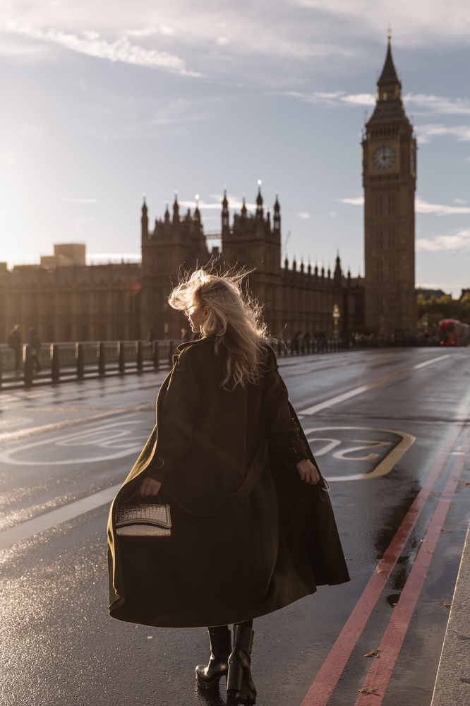 Back view of traveler girl enjoying sights of London 