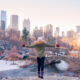 woman standing in front of buildings in NYC in January