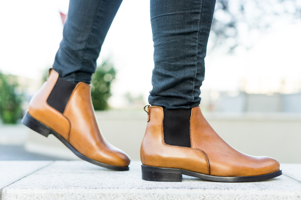 Close up of light brown Chelsea boots, the perfect addition for what to wear in London in Summer.