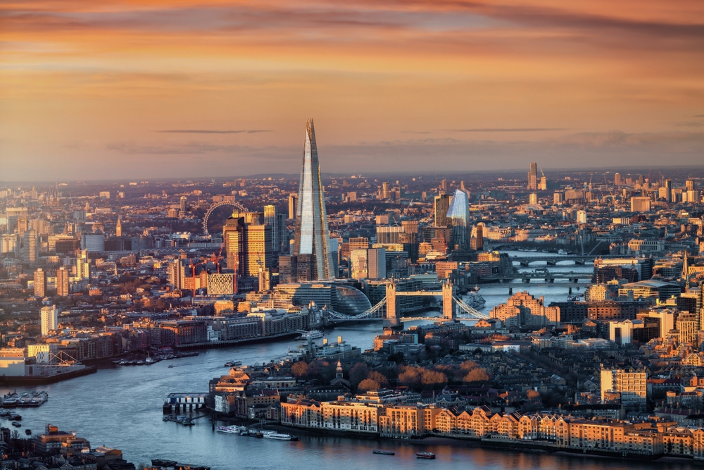 the first two week Europe Itinerary starts in London, an arial view of London with thames river and all the sites at sunset