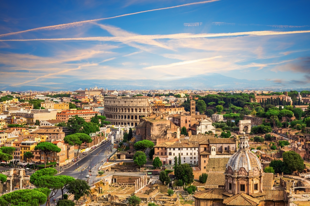 The city of Rome from an arial view of the Colosseum and ancient Roman ruins