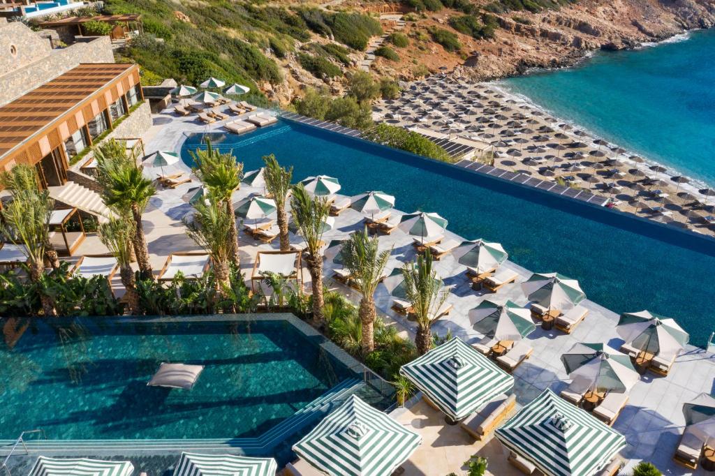 View from above of several pools and the beach and ocean. One of the best spa resorts in Europe