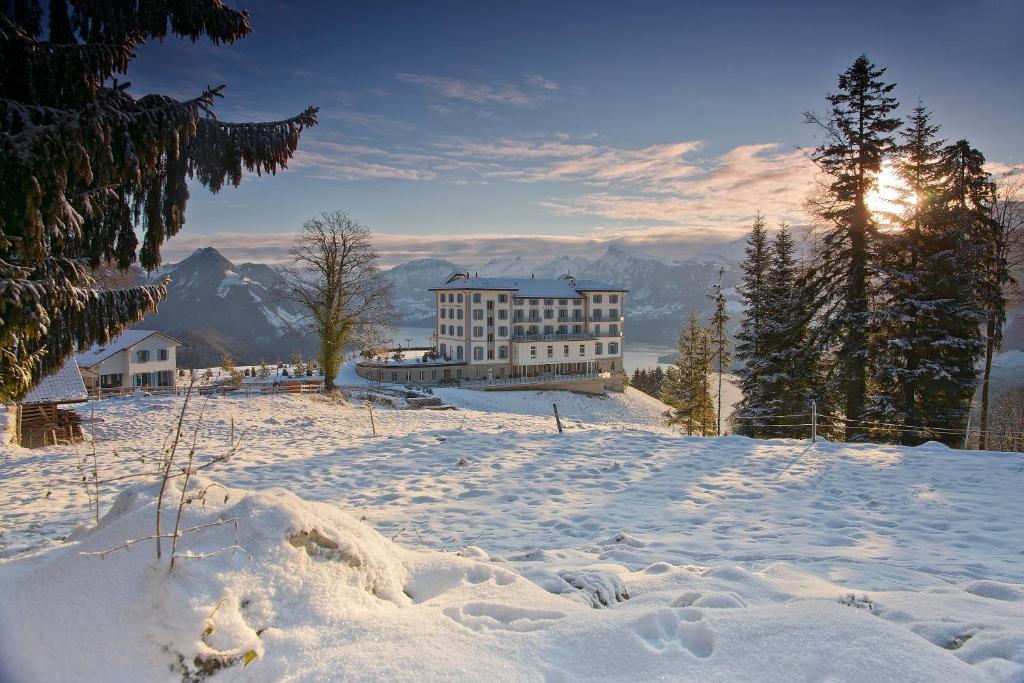 A picture of a hotel in the snow it is one of the best spa resorts in Europe. 