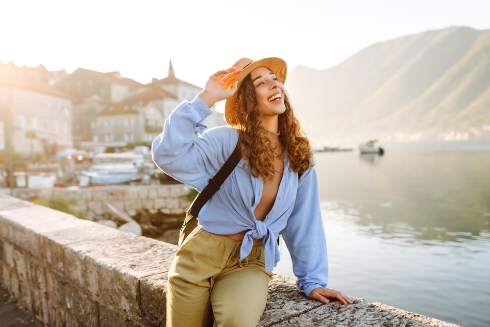 When wondering what to wear in Europe in Summer, channel this inner model: a plain t-shirt with a button up protects you from the sun, and linen pants are light and airy. 