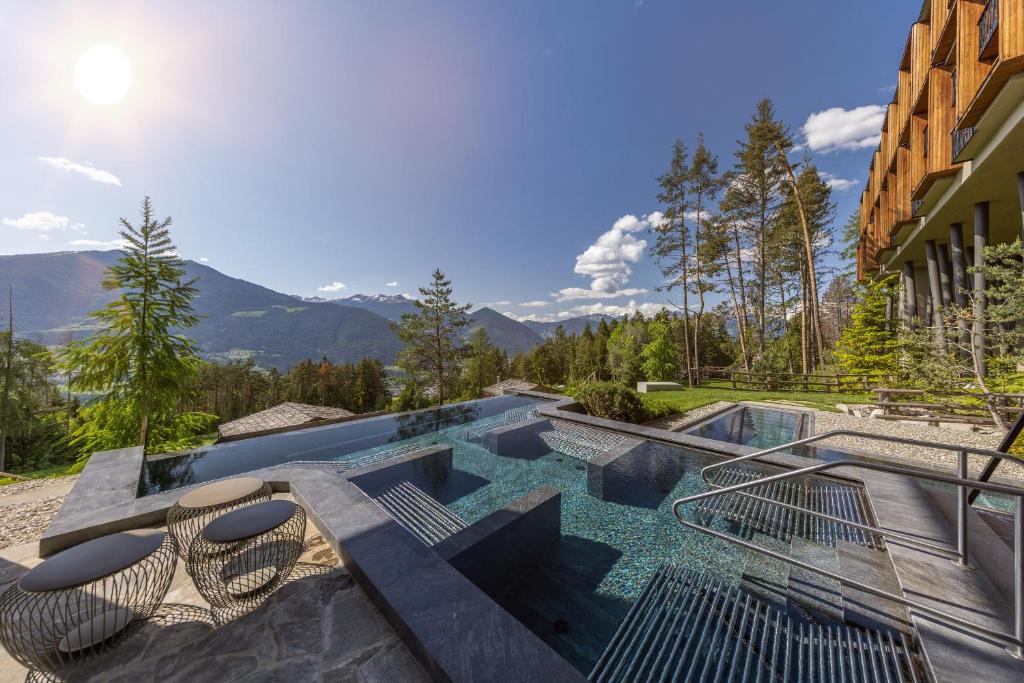 View of spa pool with a view over the mountains. 