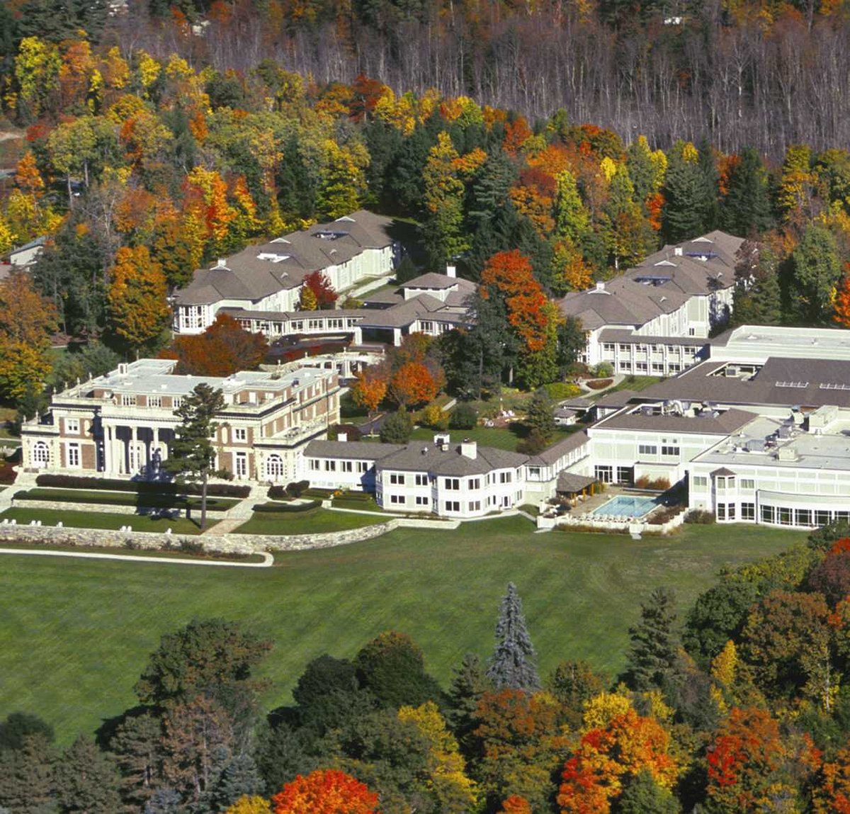 The Canyon Ranch Lenox is one of the best spas in USA, in autumn  time with trees around on an Arial view