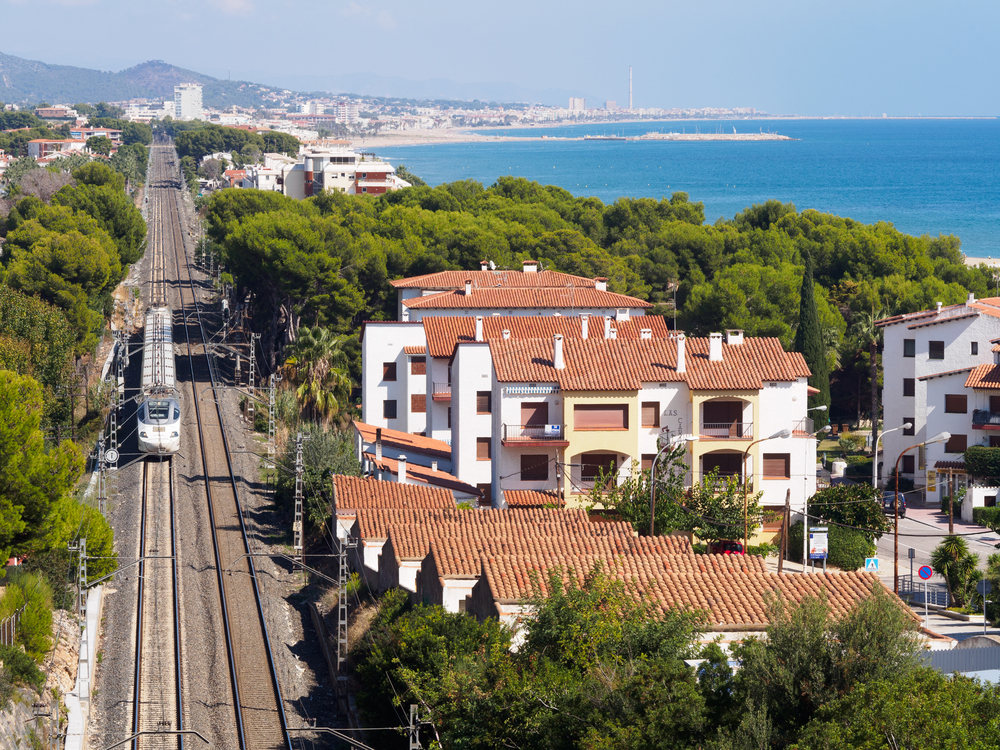 When you travel Europe by train in Spain, you have stunning ocean vistas mixed with cities on your journey