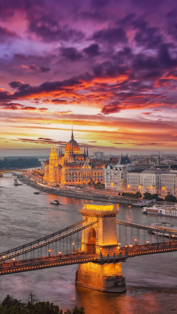 Night scene at river Danube and famous building of Hungarian Parliament and Chain Bridge. Location: Budapest city, Hungary, Europe.