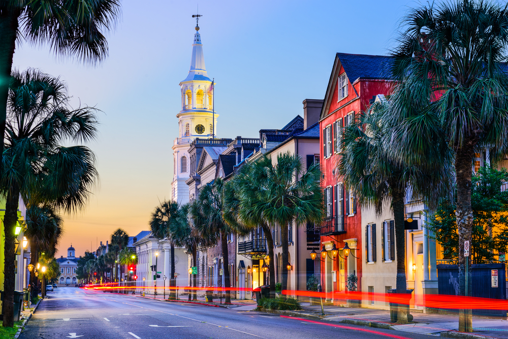 Where to Honeymoon On A Budget. Charleston, South Carolina, USA cityscape in the historic French Quarter at twilight.